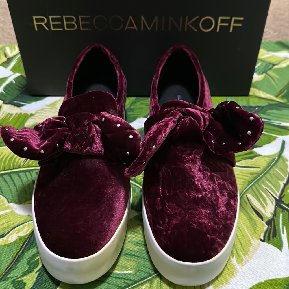 Rebecca Minkoff in a vibrant maroon color